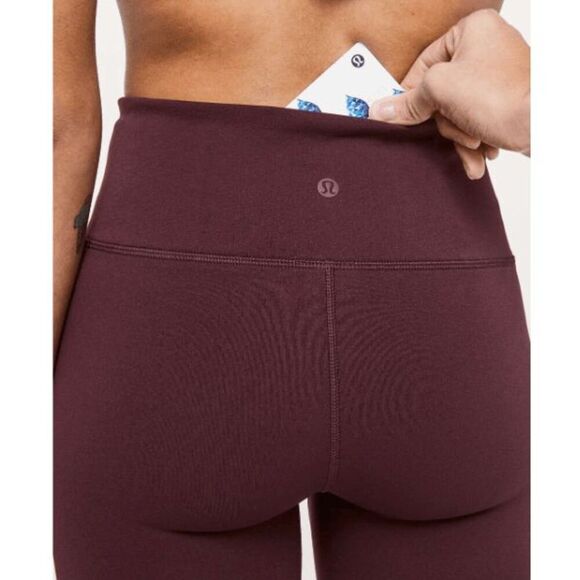 Lululemon size 12 burgundy Reveal tights/ leggings *FLAW* - Picture 3 of 9
